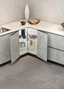 Round lazy susan swivel basket in kitchen corner cabinet