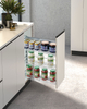 Tall narrow pull out pantry basket installed in kitchen cabinet