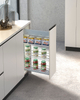 Slim pull out pantry storage system installed in narrow kitchen cabinet