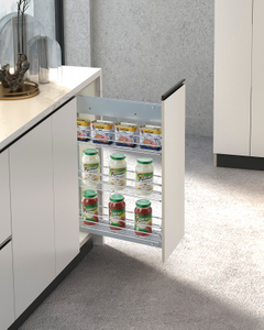 Slim pull out pantry storage system installed in narrow kitchen cabinet