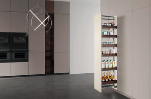 Steel wood slide out pantry system installed in a modern kitchen larder cabinet